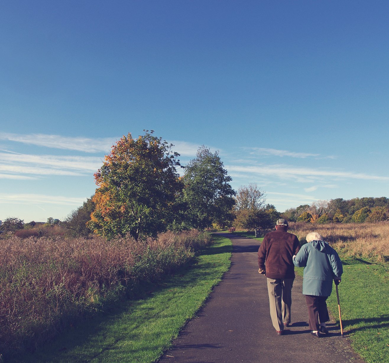 Old Couple Walking in Nature