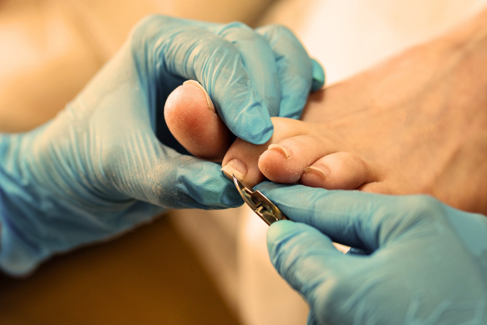 Woman Getting Foot Care Procedure